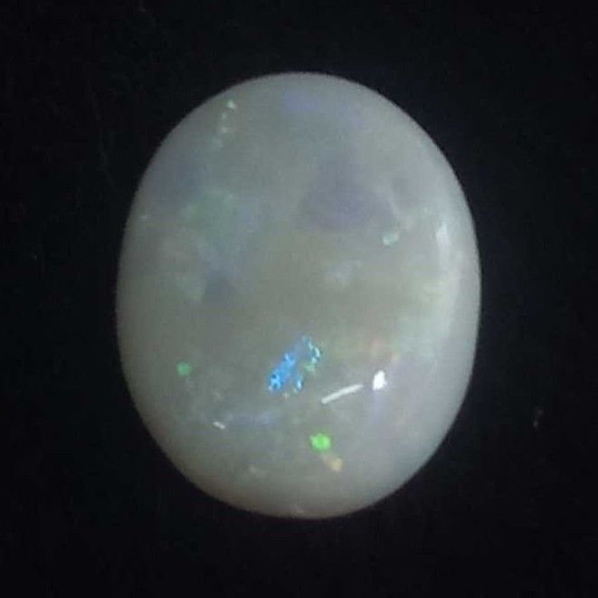 3.61ct oval multicolored opal